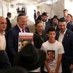 image for Trump posing for photos with family members of an October 7 hostage
