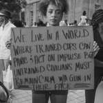 image for Woman protesting police brutality five years ago in Texas.