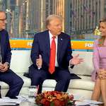 image for Trump sitting on a towel, for some reason