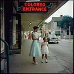 image for Mom and daughter in front of a department store, Mobile, Alabama. 1956