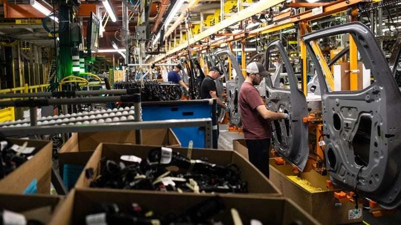 image for GM’s profit nears a record a year after saying it couldn’t afford its workers’ pay demands