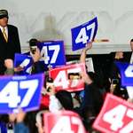 image for Trump arrives 3 hours late to rally dressed in black playing the Undertaker entrance theme music.