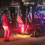 image for This is Kamala Harris in chains in a "friendly" parade. Slavery is their endgame.