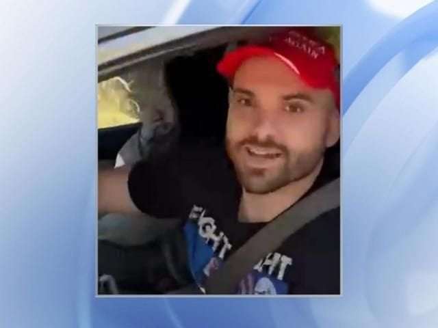 image for Man caught on video removing, ripping up Harris-Walz signs outside Raleigh early voting site