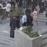 image for Iranian student, goes half-naked defying the Hijab enforcers after they torn part of her clothing.