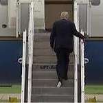image for President Donald Trump boards Air Force One with toilet paper stuck to his shoe