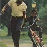 image for A father teaching his son to ride a bicycle in Central Park, New York City, in 1973