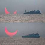 image for In Qatar, Elias Chasiotis photographed a striking “Devil’s Horns” sunrise caused by a partial eclips