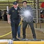 image for This student starting a firehose and a photo being taken at the exact moment