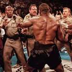 image for Las Vegas Police facing Mike Tyson after he'd just bitten Evander Holyfield's ear off, 1996.