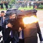 image for Elite bodyguards from vietnam's security showcased a demonstration, protecting their target.