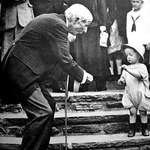 image for Billionaire John D. Rockefeller gives a nickel to a child on his 84th birthday, USA, 1923.