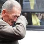 image for October 2010, a South Korean man shedding a tear as he said goodbye to his North Korean relative.