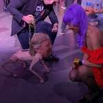 image for Fake Elon and Donald Trump dog at Beeple election night event.