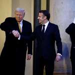 image for Trump grabs and pulls Macron's hand for another awkward handshake Saturday in Paris