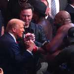 image for Elon Musk shaking his own hand while Donald Trump and Jon Jones share a handshake