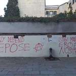 image for ‘Deny Defend Depose’ & ‘Luigi Mangione our hero’ seen spray painted on a wall in Venice, Italy