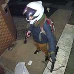 image for Nick Fuente’s Attacker, standing outside his door, armed