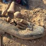 image for Mother's shoe with remains found in newly discovered Kurdish genocide mass grave in Iraq