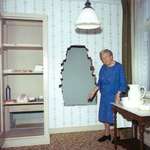 image for Corrie ten Boom showing off her secret room which hid and saved hundreds of Jews from the Holocaust.