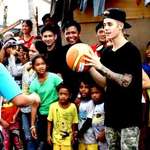 image for Bieber flew unannounced to the Philippines just over a month after it was devastated by Yolanda.