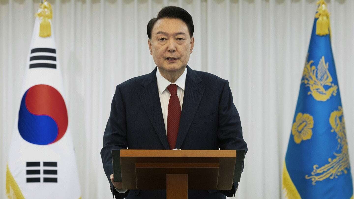 image for South Korean court issues warrants to detain impeached President Yoon and search his office