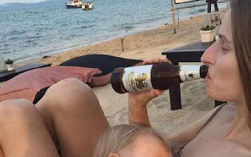 image for Psychologist seen drinking beer while breastfeeding child; LinkedIn post goes viral