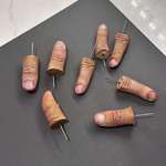 image for I made corn on the cob holders with molds of my fingers