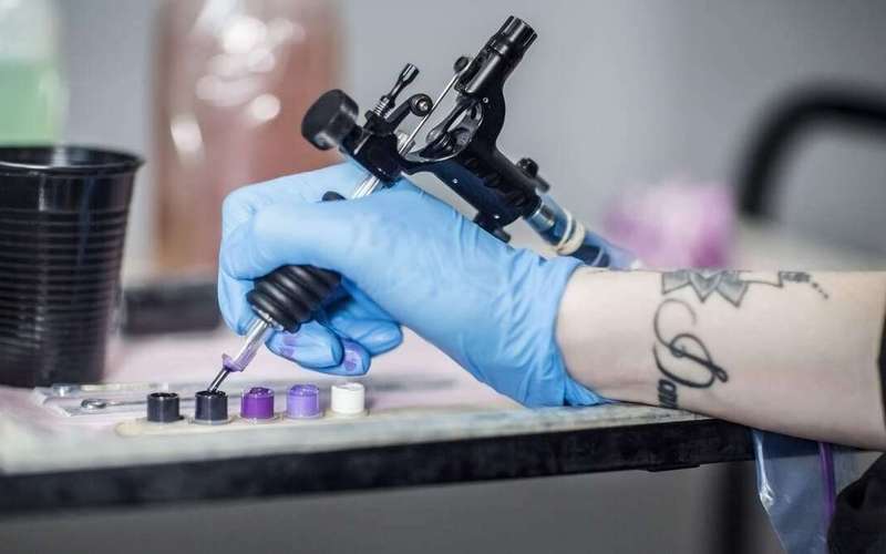 image for Tattoo Artist Criticized For Giving 9-Year-Old Girl An American Flag Tattoo