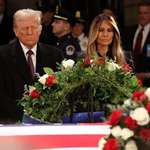 image for The president of selfishness pays his respects to the president of selflessness.