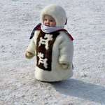 image for A Yakut child in traditional winter dress, Siberia