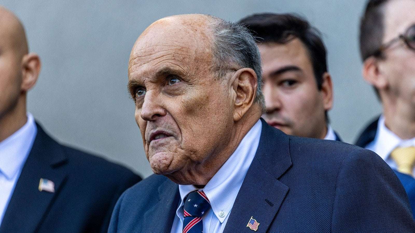 image for Federal judge holds Rudy Giuliani in contempt of court for repeating false claims about election workers
