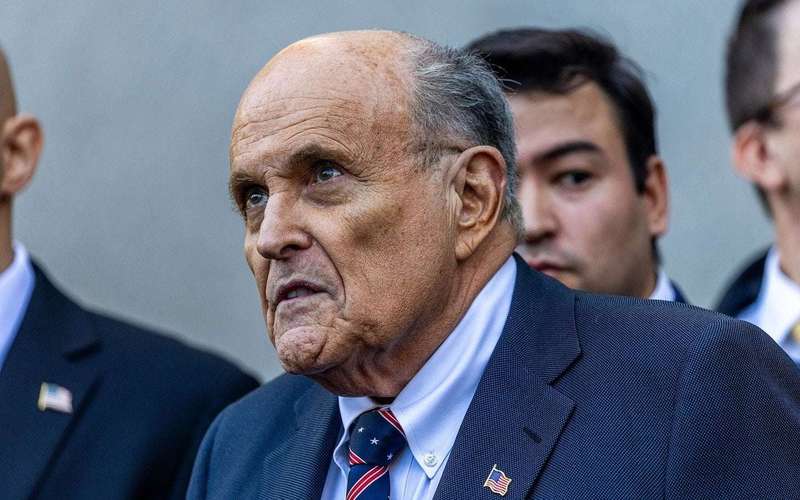 image for Federal judge holds Rudy Giuliani in contempt of court for repeating false claims about election workers