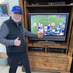 image for Wolf Blitzer showing off his 32-Inch 420p TV with DVD and VHS players