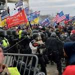 image for Terrorists fight cops at US Capitol, January 2021. Years before receiving full presidential pardons