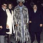 image for Frank Lucas, the drug lord who ruled Harlem in the 1970s, wearing his infamous $100K chinchilla coat