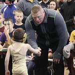 image for That time Brock Lesnar shook hands with the kid who beat his son in a wrestling match.