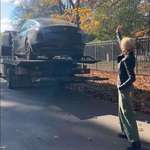 image for Sheryl Crow waiving to her Tesla, as she sold it as a protest to "President Musk"