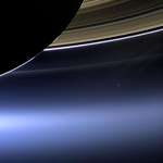 image for That tiny blue dot is Earth. Photo taken by spacecraft Cassini as it drifted near Saturn.