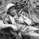 image for My grandpa Rudy was wounded 80 years ago today on Iwo Jima. A photographer captured it.