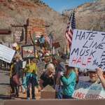 image for Park Rangers protesting over firing by the government at the entrance of Zion National Park