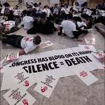 image for HIV/AIDS activists protest the U.S. global aid freeze, which has disrupted HIV treatment worldwide.