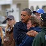 image for Obama comforts hurricane victim 10/31/2013