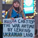 image for Protester shows their support for Ukraine.