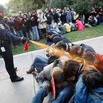 image for UC Davis Police pepper spray non-violent student protesters, 2011.