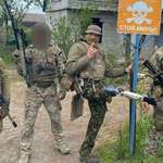 image for The sign says "stop, landmines." Half of Ukrainian amputee soldiers plan to return to the front