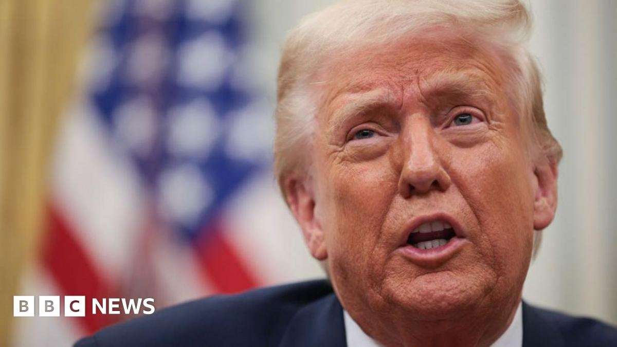 image for Stocks fall as Trump warns of US economy trade war 'transition'