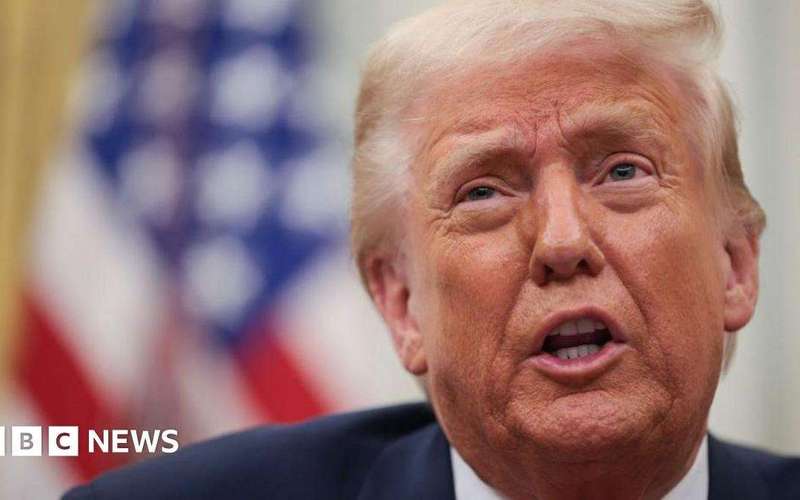 image for Stocks fall as Trump warns of US economy trade war 'transition'