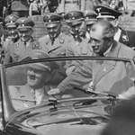 image for Adolf Hitler and Ferdinand Porsche in a Volkwagen in 1938, akin to Donald Trump &  Elon Musk in 2025