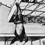 image for The corpse of Mussolini hanging by his feet in the Piazzale Loreto, Milan. April 1945